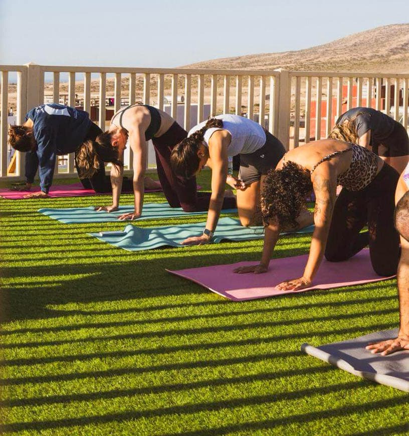 Yoga sessions on rooftop terrace with ocean view