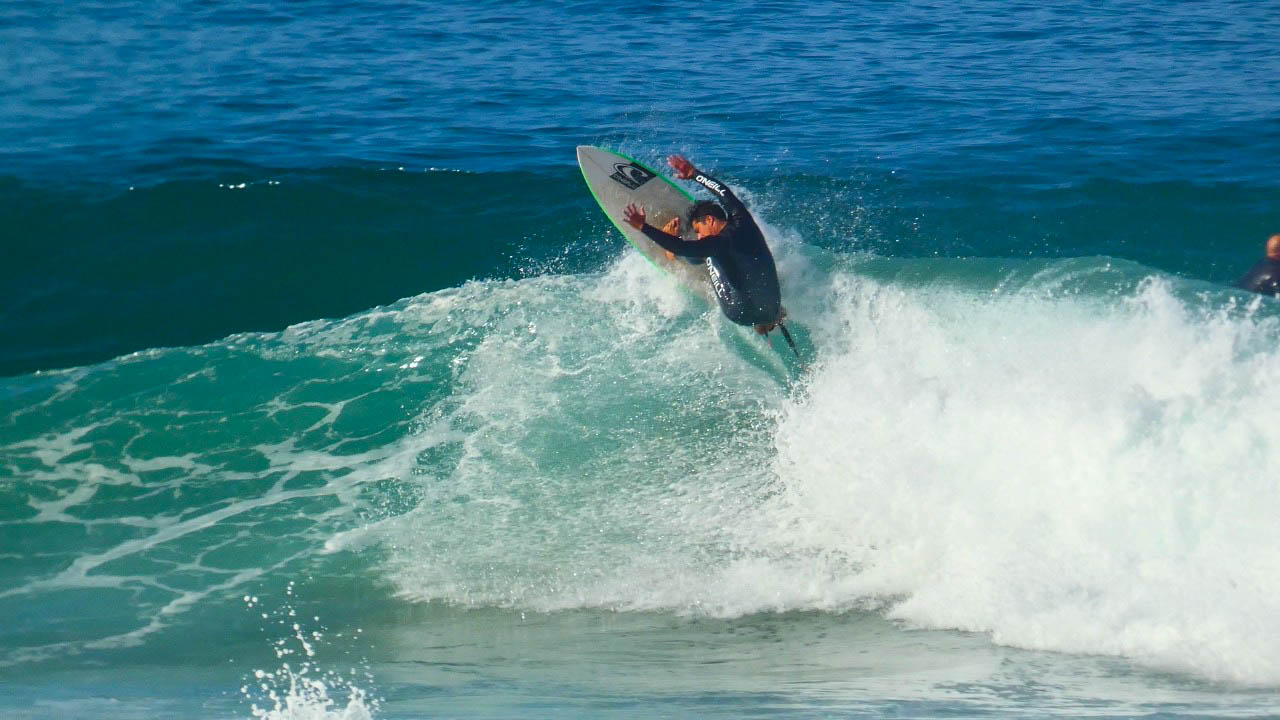 Surf with kids Morocco — coached kids surf session at Imsouane Bay inside section